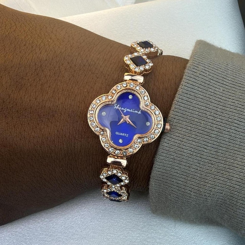 Gold and blue clover watch